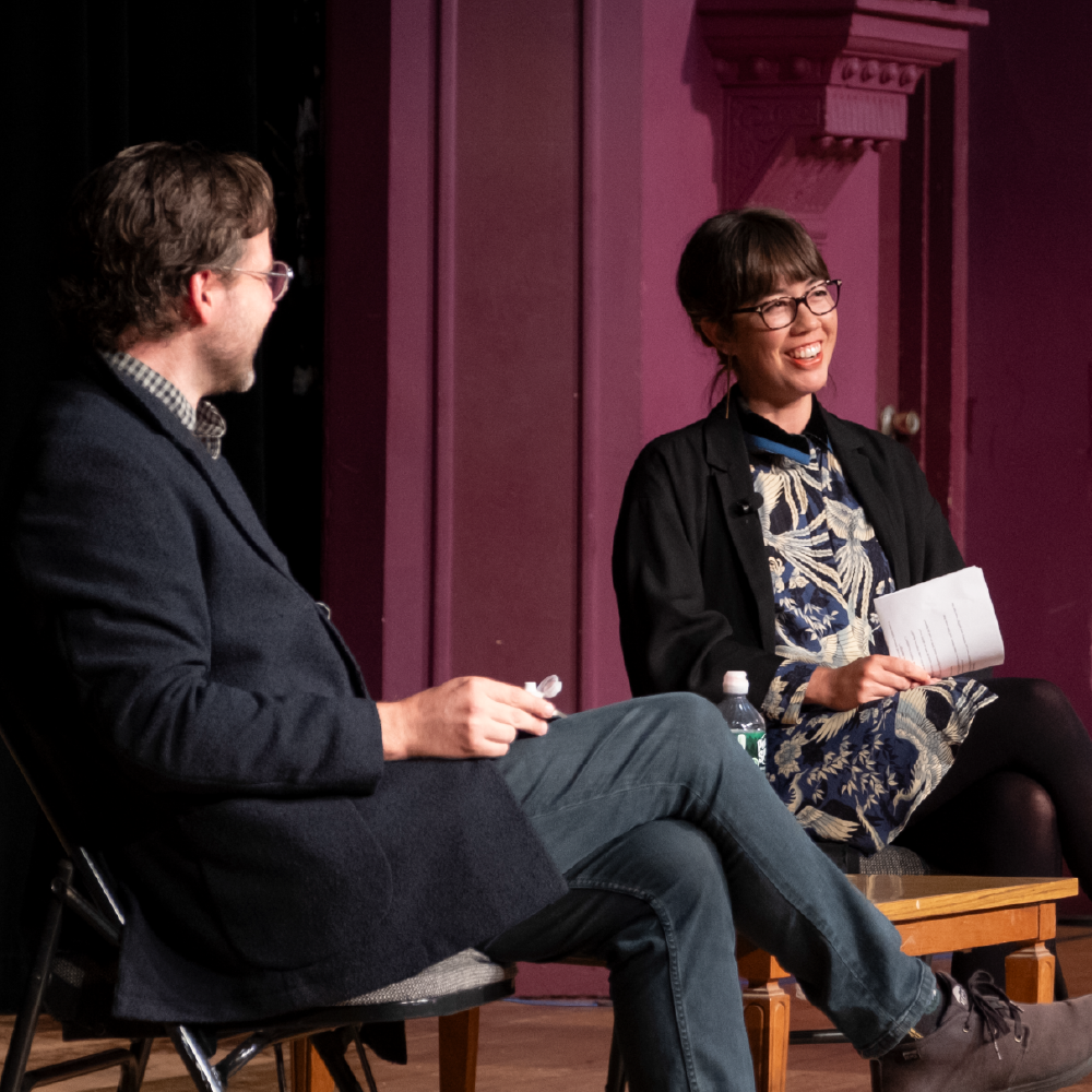 Jenny Odell and Nathan Schneider conversing on stage